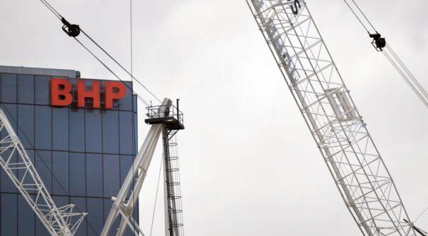 A BHP sign adorns the side of their headquarters in Melbourne, Australia, on Feb. 19, 2019. (William West/AFP via Getty Images)