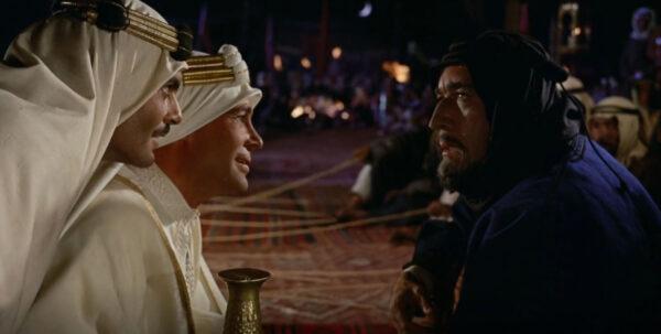 (L–R) Sherif Ali (Omar Sharif), T.E. Lawrence (Peter O’Toole), and Auda Abu Tayi (Anthony Quinn) match wits, in “Lawrence of Arabia.” (Columbia Pictures)