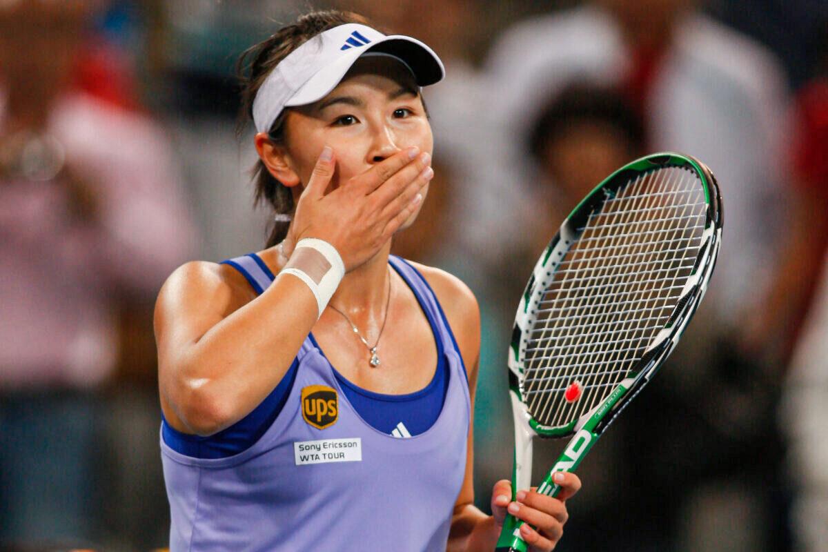Chinese tennis player Peng Shuai reacts during a tennis match in Beijing, China, on Oct. 6, 2009. (AP Photo/Ng Han Guan)