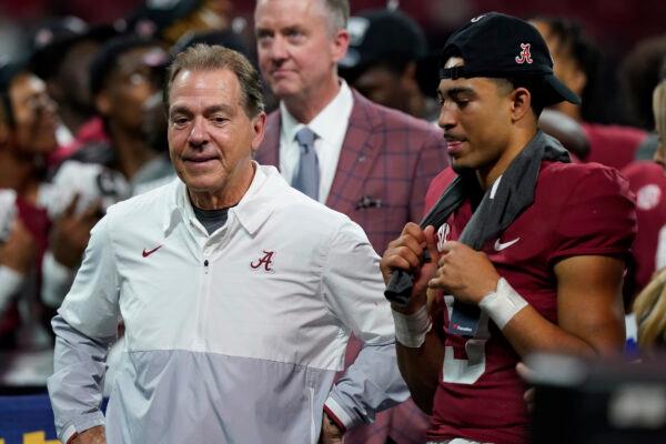 Alabama head coach Nick Saban and Alabama quarterback Bryce Young celebrate the team's win after the Southeastern Conference championship NCAA college football game between Georgia and Alabama, in Atlanta on Dec. 4, 2021. (Brynn Anderson/AP Photo)