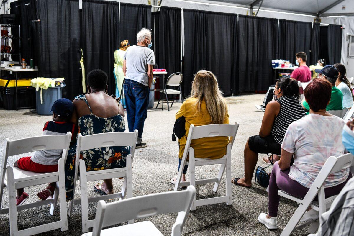Patients wait for their treatment inside the Regeneron Clinic at a monoclonal antibody treatment site in Pembroke Pines, Fla., on Aug. 19, 2021. (Chandan Khanna/AFP via Getty Images)