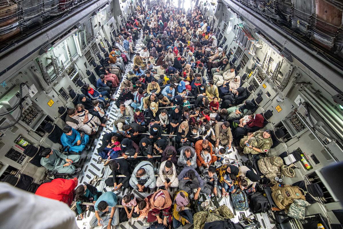 In this handout image provided by the Ministry of Defence, a full flight of 265 people are evacuated out of Kabul by the UK Armed Forces in Kabul, Afghanistan, on Aug. 21, 2021. (Ben Shread/MoD Crown Getty Images)