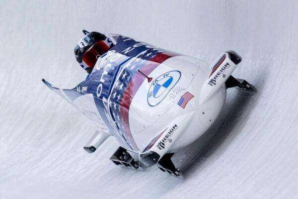 Kaillie Humphries and Lolo Jones of the United States compete during the first run of the 2-woman bobsleigh competition of the IBSF Bob and Skeleton World Cup at Olympia Bobbahn Igls on Nov. 28, 2021, in Innsbruck, Austria. (Jan Hetfleisch/Getty Images)