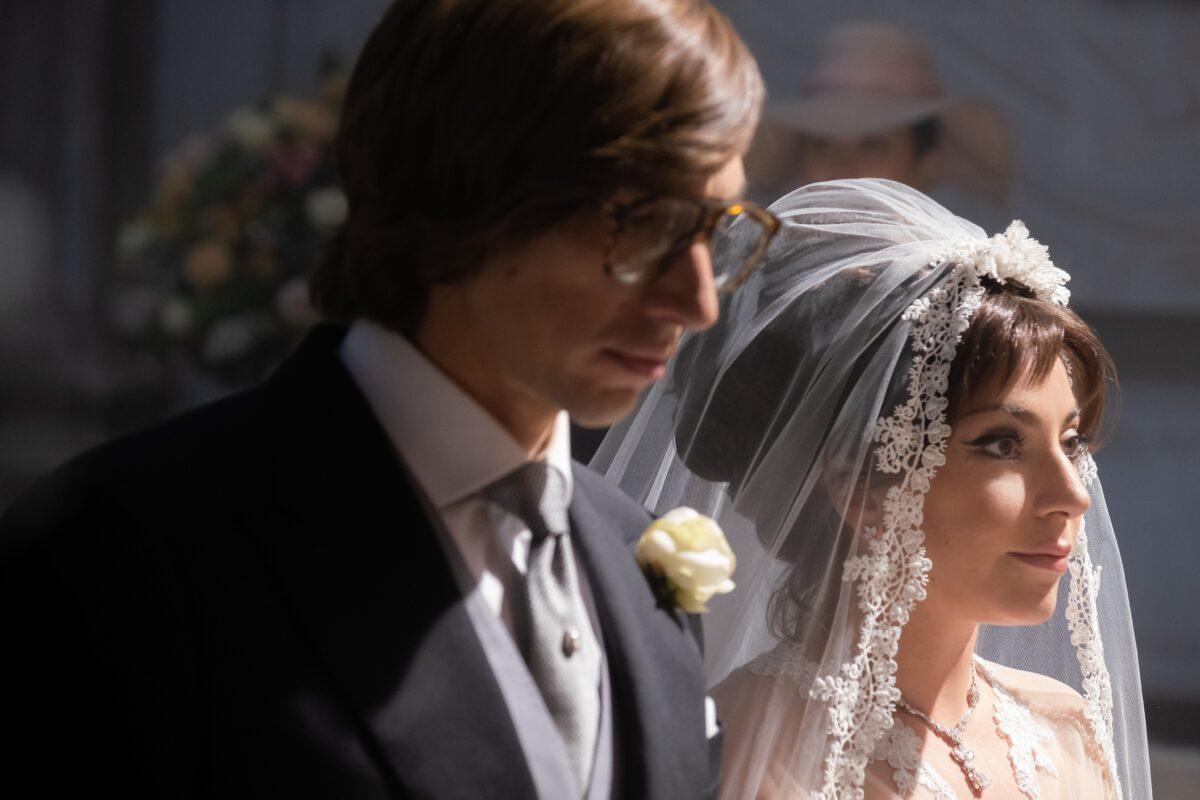 Maurizio Gucci (Adam Driver) and Patrizia Reggiani (Lady Gaga) get married, in Ridley Scott's "House of Gucci." (United Artists Releasing/Universal Pictures)