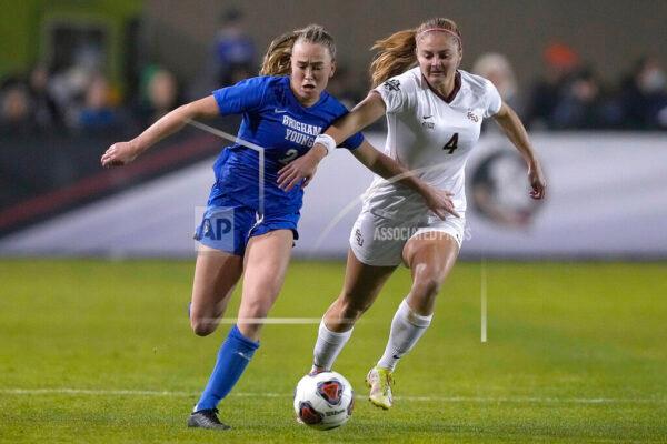BYU's Olivia Smith (2) battles for the ball against Florida State's Kristina Lynch (4) during the second half of the NCAA College Cup women's soccer final in Santa Clara, Calif., on Dec. 6, 2021. (Tony Avelar/AP Photo)