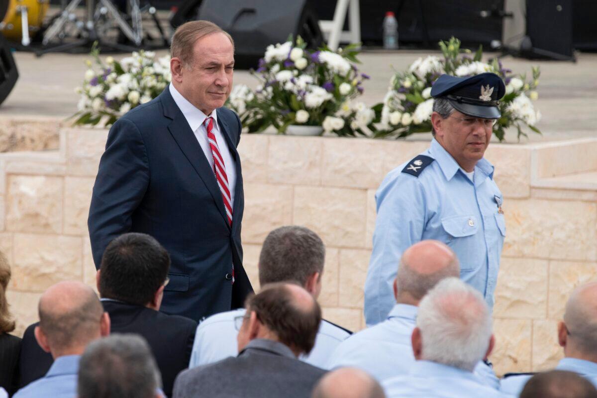 Israeli Prime Minister Benjamin Netanyahu (R) and Israel's air force commander Major General, Amir Eshel, attend a ceremony to announce the operational capacity of the country's David's Sling missile defense system at the Hatzor Air Force base on April 2, 2017. (Jack Guez/AFP via Getty Images)