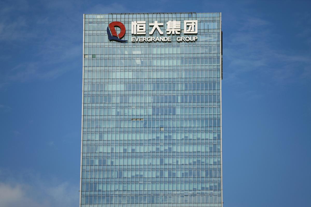 Evergrande Faces Huge Debt Maturity as Sales Fall by Nearly 40 Percent in 2021