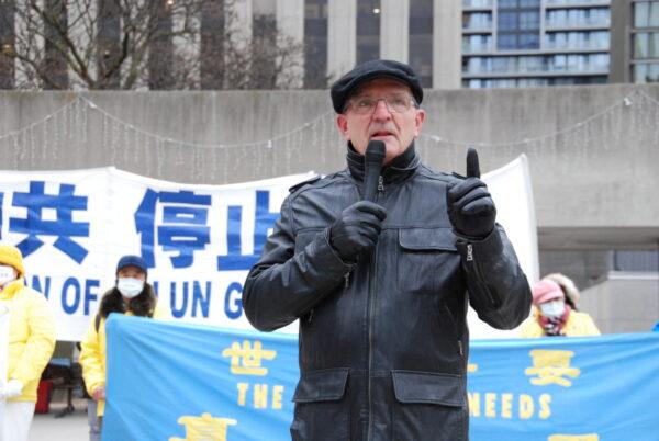Former Conservative MP Wladyslaw Lizon speaks to Falun Gong adherents at a rally at Toronto City Hall on Dec. 7, 2021. (Michelle Hu/The Epoch Times)
