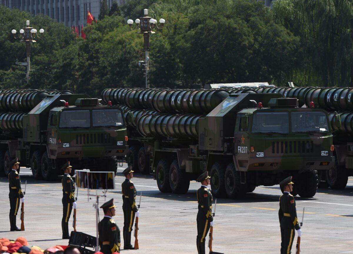 Chinese People's Liberation Army HQ-9 surface-to-air missile launchers are seen during a military parade at Tiananmen Square in Beijing on Sept. 3, 2015. A modified version of this missile was used to shoot down a satellite in a test by China in 2007. (Greg Baker/AFP via Getty Images)