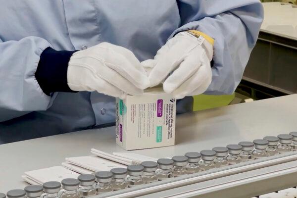 A worker packages the AstraZeneca’s Evusheld medication in an undated video. (AstraZeneca via AP)