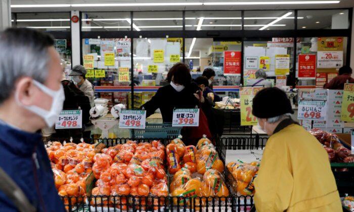 Japan's January Consumer Inflation Slows, Trade Deficit Biggest in 8 Years: Poll