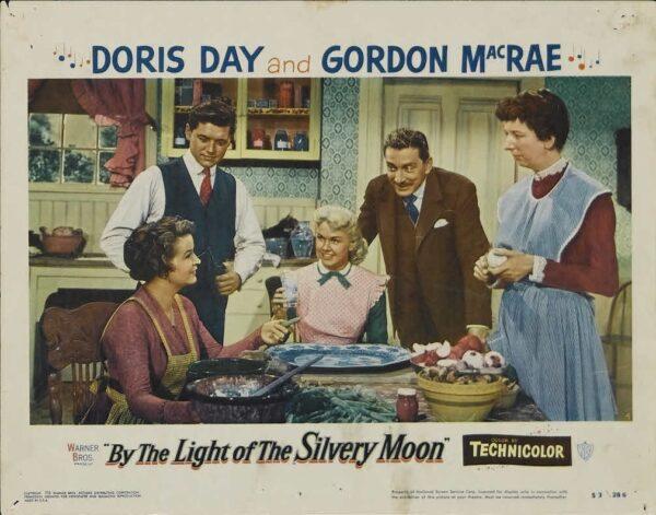 The Winfields prepare Thanksgiving dinner together. A lobby card for "By the Light of the Silvery Moon." (MovieStillsDB)