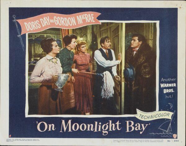 Fearing mistakenly that the Winfield women need rescuing, William Sherman (Gordon MacRae) rushes in to save them. A lobby card for "On Moonlight Bay."(MovieStillsDB)