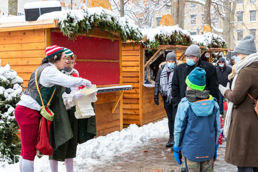Passersby partake in the festivities of Quebec City’s German Christmas Market. (Dennis Lennox)