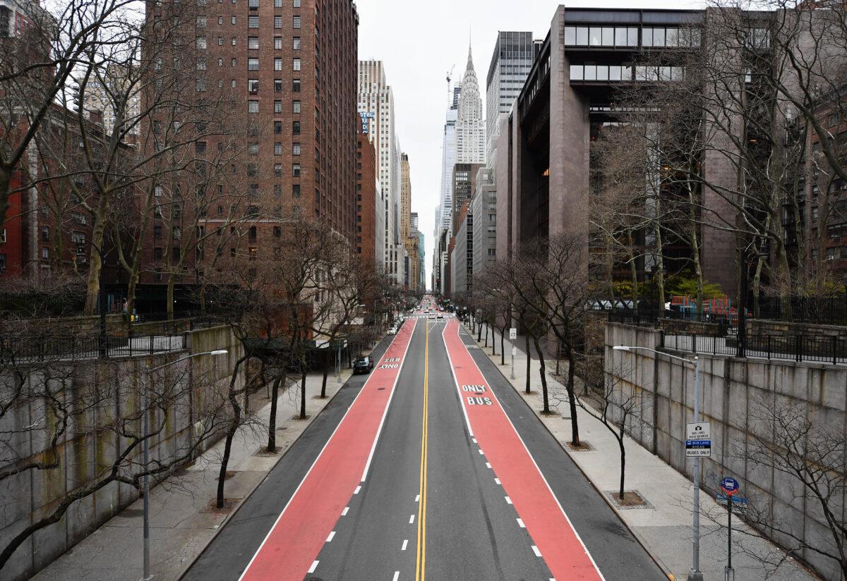 A nearly empty 42nd Street is viewed on March 25, 2020 in New York City. (ANGELA WEISS/AFP via Getty Images)