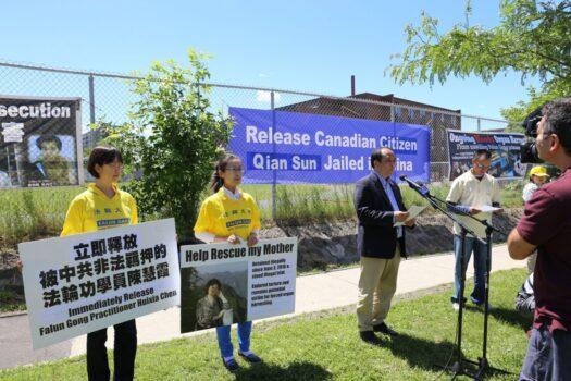 Falun Dafa Association of Canada president Li Xun speaks during a rally outside the Chinese Embassy in Ottawa on June 26, 2017, calling for the release of Canadian citizen Sun Qian who is currently detained in China for practicing Falun Gong. (Donna He/The Epoch Times)