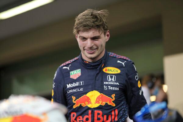 Red Bull driver Max Verstappen of the Netherlands smiles after winning the pole position for the Formula One Abu Dhabi Grand Prix in Abu Dhabi, United Arab Emirates, on Dec. 11, 2021. (Kamran Jebreili, Pool/AP Photo)