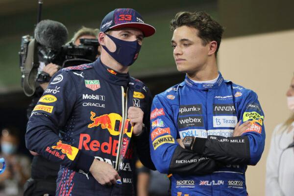 Red Bull driver Max Verstappen of the Netherlands talks to third places Mclaren driver Lando Norris of Britain after winning the pole position for the Formula One Abu Dhabi Grand Prix in Abu Dhabi, United Arab Emirates, on Dec. 11, 2021. (Kamran Jebreili, Pool/AP Photo)