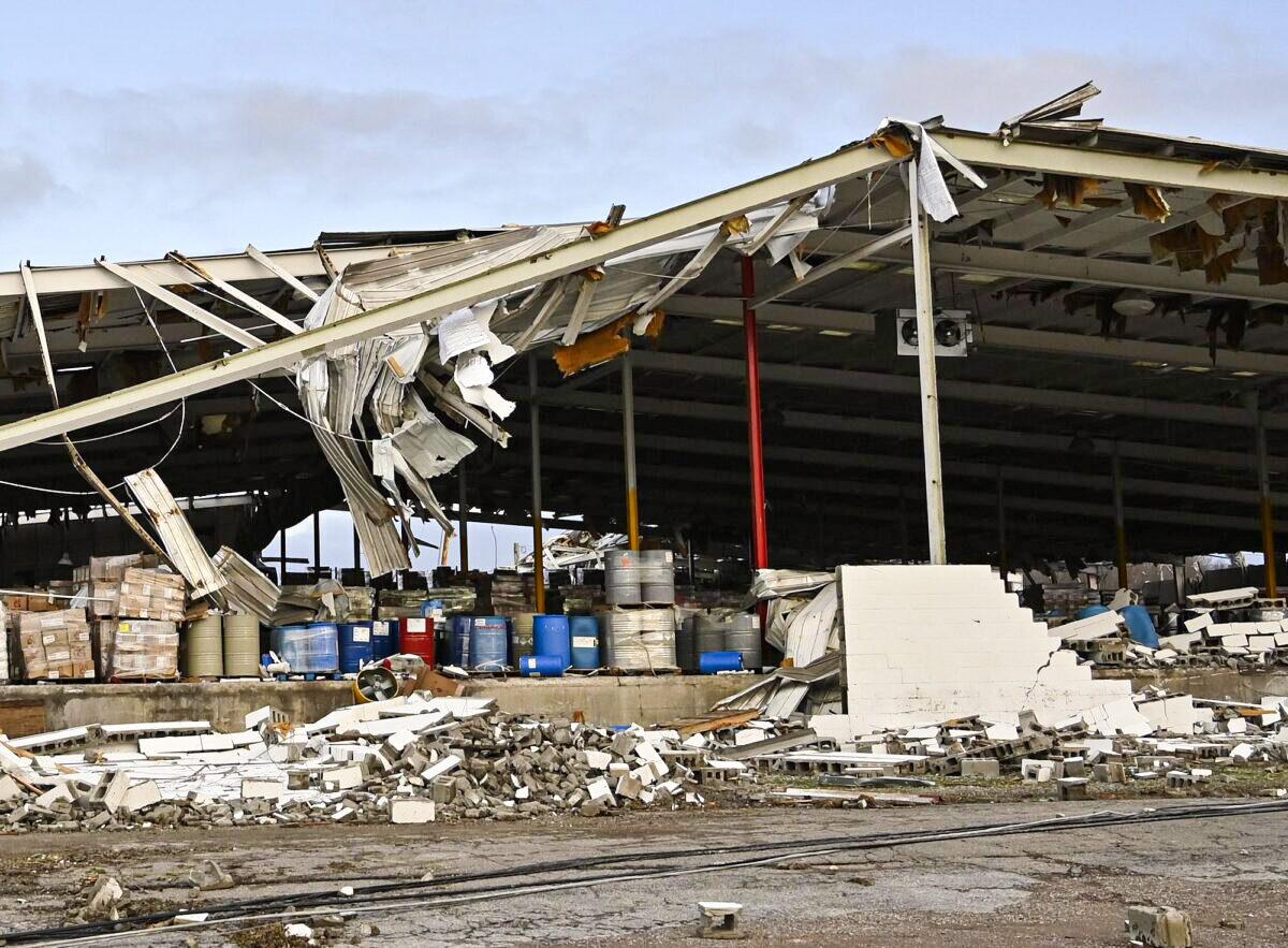 A feed store damaged by a tornado is seen in Mayfield, Ky., on Dec. 11, 2021. (Timothy D. Easley/AP Photo)