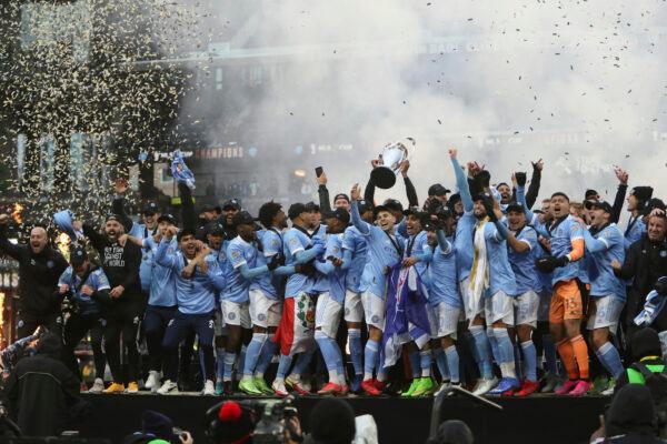 New York City FC players celebrate their penalty kick shootout win over the Portland Timbers in the MLS Cup soccer game, in Portland, Ore., on Dec. 11, 2021. (Amanda Loman/AP Photo)