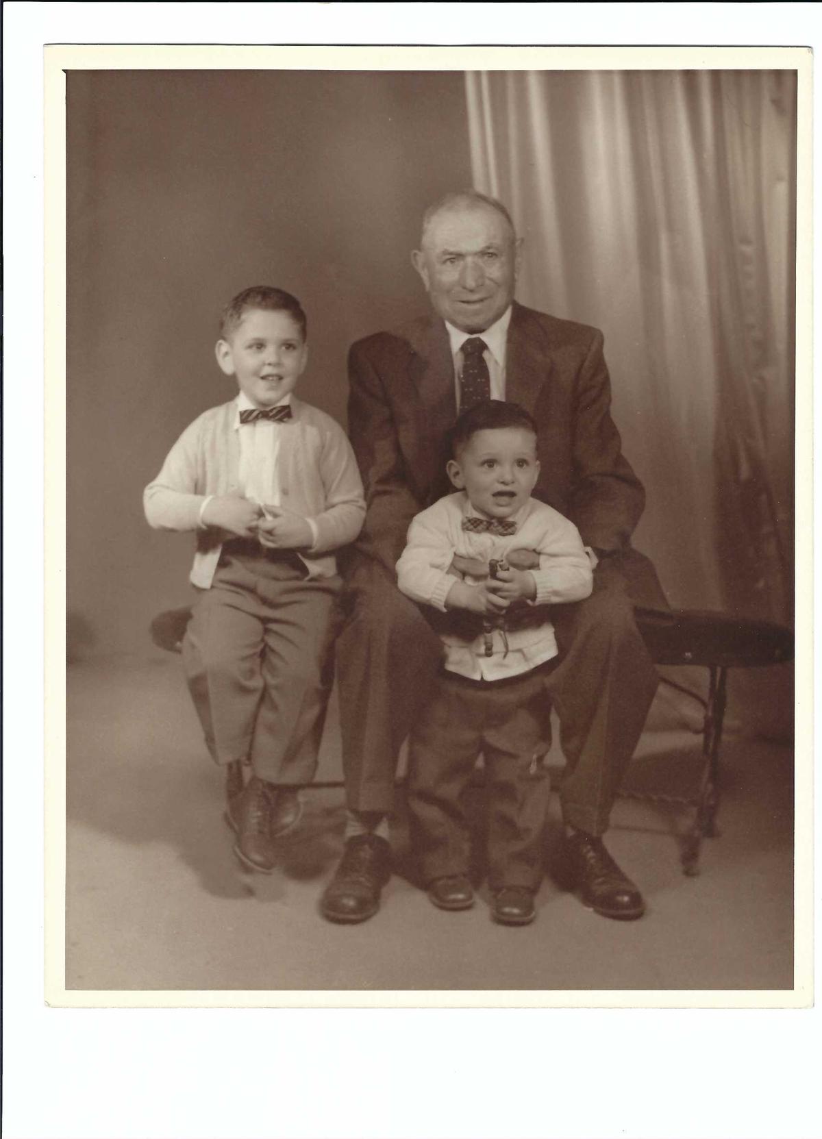 Author Cindy Alfieri's nonno, Gaspari Alfieri, with two of her brothers in the 1950s. (Courtesy of Cindy Alfieri)