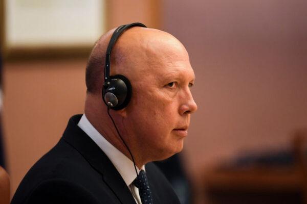 Australian Defence Minister Peter Dutton reacts during a bilateral meeting with South Korean President Moon Jae-in at Parliament House on December 13, 2021 in Canberra, Australia. (Lukas Coch - Pool/Getty Images)