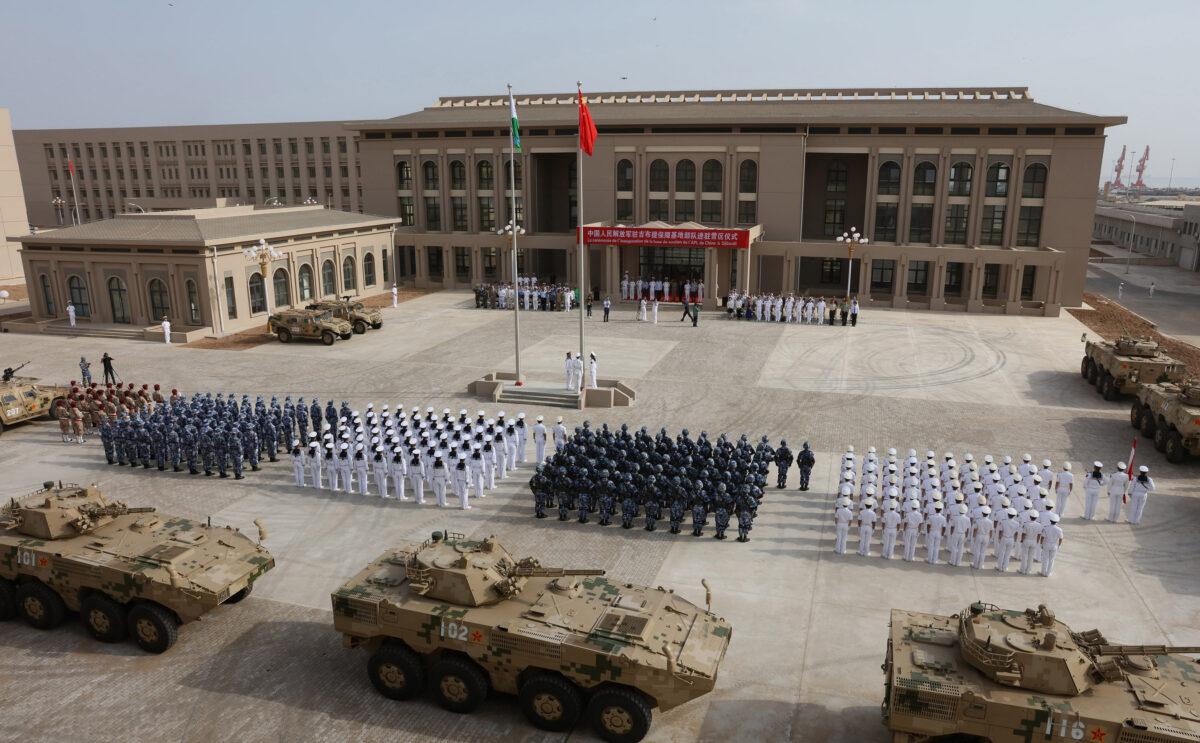 This photo taken on Aug. 1, 2017, shows Chinese People's Liberation Army personnel attending the opening ceremony of China's new military base in Djibouti. (STR/AFP via Getty Images)