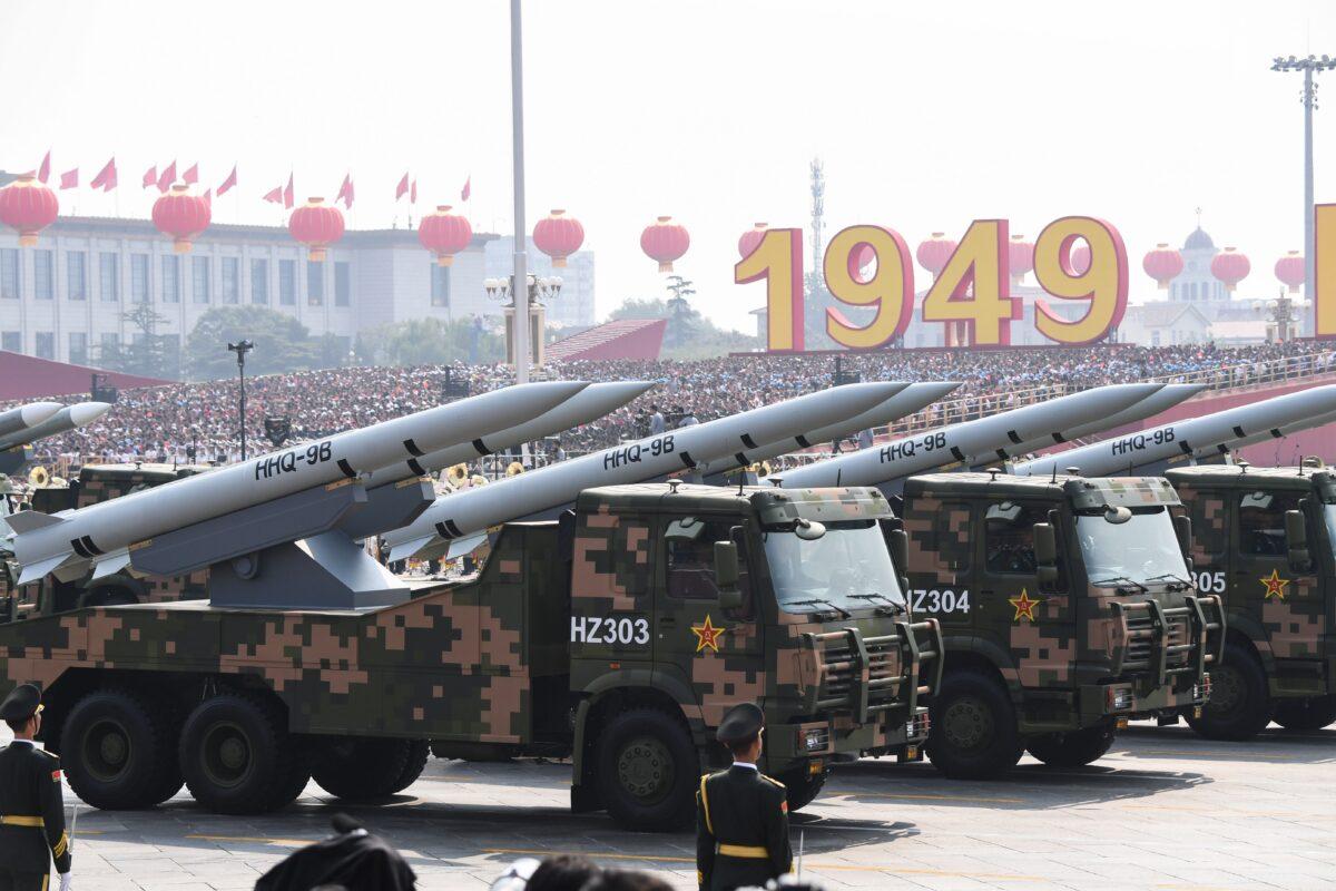 Military vehicles carrying HHQ-9B surface-to-air missiles participate in a military parade at Tiananmen Square in Beijing on Oct. 1, 2019, to mark the 70th anniversary of the founding of the Peoples Republic of China. (Photo by GREG BAKER / AFP) (Photo credit should read GREG BAKER/AFP via Getty Images)