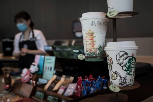 Illustrations drawn by employees on coffee cups at Starbucks during the Five-day May Day holiday in Wuhan, China, on May 3, 2020. (Getty Images)