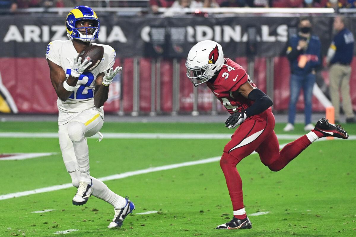 Van Jefferson #12 of the Los Angeles Rams catches a touchdown pass against the Arizona Cardinals during the third quarter at State Farm Stadium in Glendale, Ariz., on Dec. 13, 2021. (Norm Hall/Getty Images)