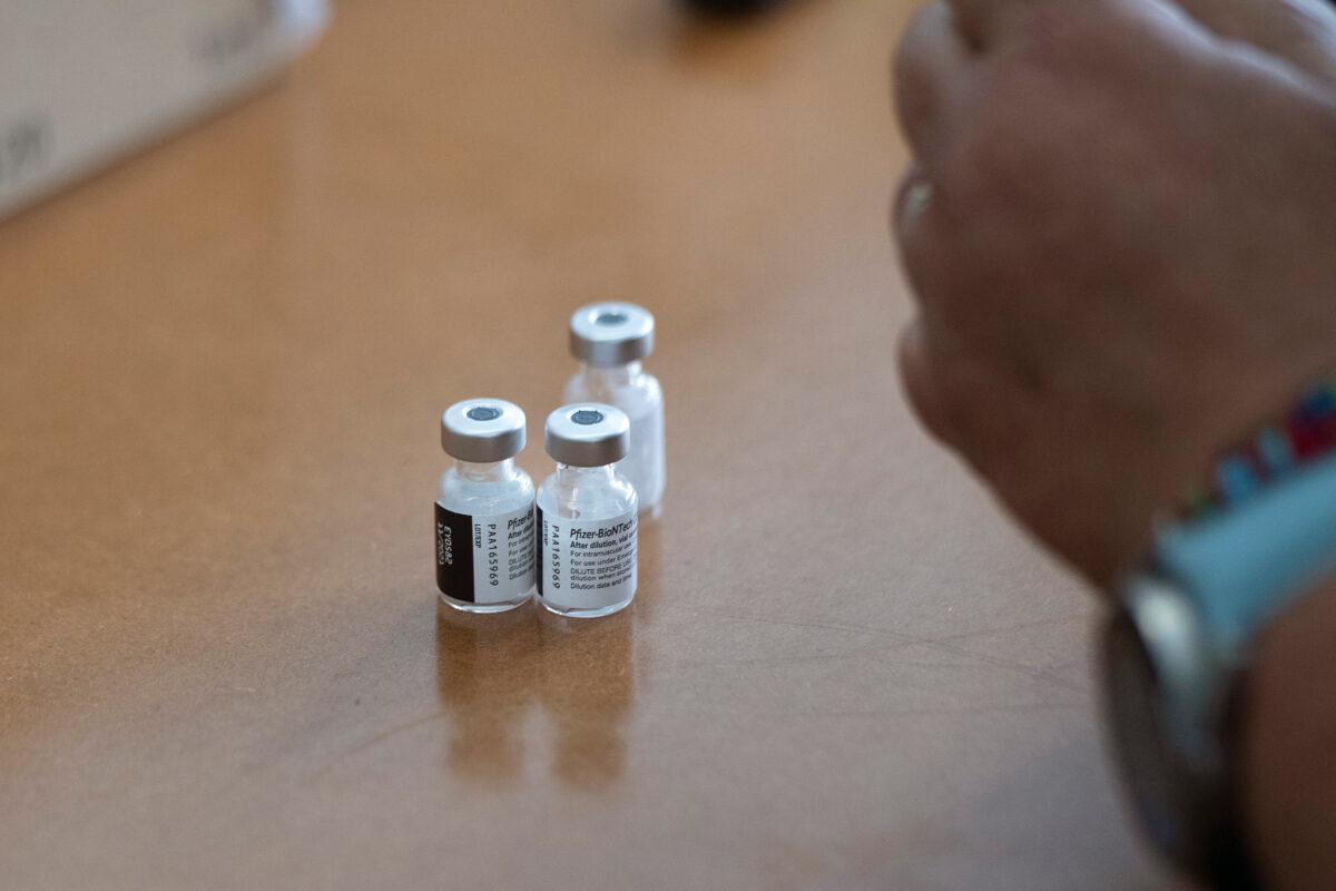 Vials of the Pfizer-BioNTech COVID-19 vaccine are seen in Cape Town, South Africa, on Dec. 8, 2021. (Rodger Bosch/AFP via Getty Images)