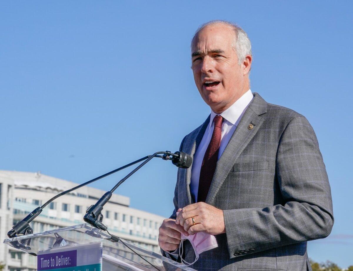 Sen. Bob Casey (D-Pa.) speaks at a rally and march on Nov. 16, 2021 in Washington. (Jemal Countess/Getty Images for SEIU)