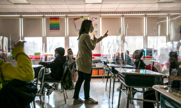 A third grade teacher at Stark Elementary School in Stamford, Conn., on March 10, 2021. (John Moore/Getty Images)