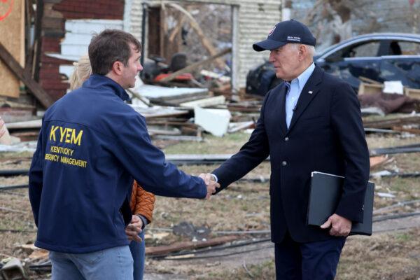 U.S. President Joe Biden greets Kentucky Governor Andy Beshear after speaking to the press in an area damaged by Friday's tornado in Dawson Springs, Kentucky on Dec. 15, 2021. (Scott Olson/Getty Images)