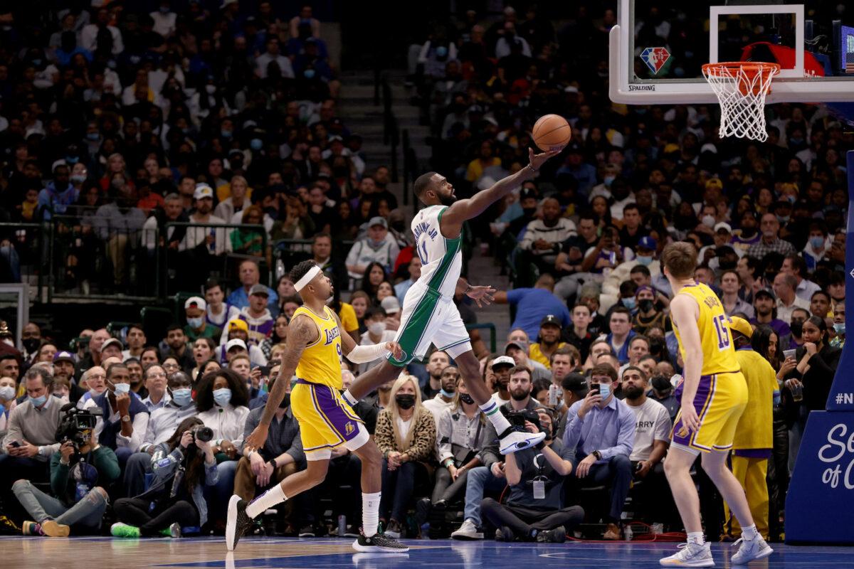 Tim Hardaway Jr. #11 of the Dallas Mavericks drives to the basket against the Los Angeles Lakers in the second half at American Airlines Center in Dallas, on Dec. 15, 2021. (Tom Pennington/Getty Images)