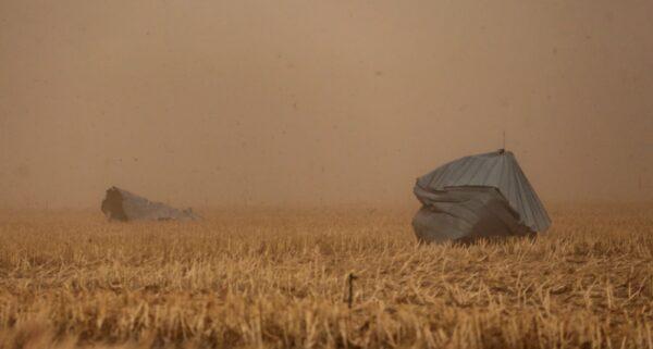 The Hodgeman County Undersheriff confirmed these grain bins were blown away from a nearby farm into cornfield across Hwy 283 in Jetmore, Kan., on Dec. 15, 2021. (Travis Heying/The Wichita Eagle via AP)