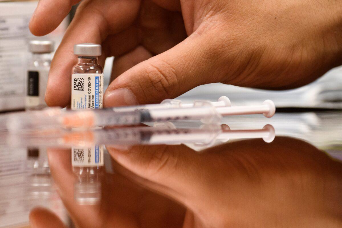 Vials and syringes of the Johnson & Johnson COVID-19 vaccine are seen in Culver City, Calif., on Aug. 5, 2021. (Patrick T. Fallon/AFP via Getty Images)