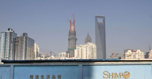 A wall carrying the logo of Shimao Group in Shanghai, China, on Jan. 1, 2013. (Stringer/Reuters)