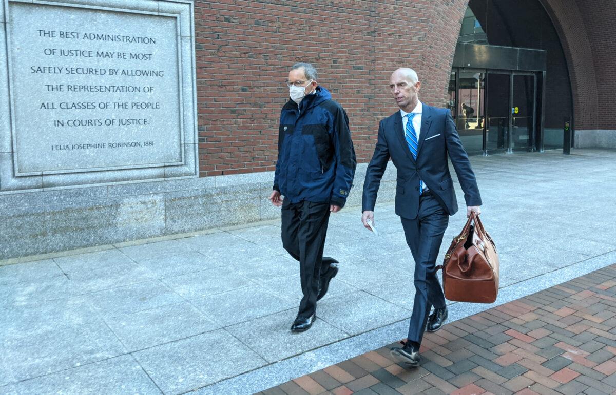 Charles Lieber (L) and his defense attorney, Marc Mukasey, exit the John Joseph Moakley U.S. Courthouse in Boston on Dec. 17, 2021. (Learner Liu/The Epoch Times)