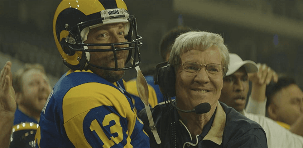 Kurt Warner (Zachary Levi, L) and Los Angeles Rams head coach Dick Vermeil (Dennis Quaid), in "American Underdog." (Lionsgate)