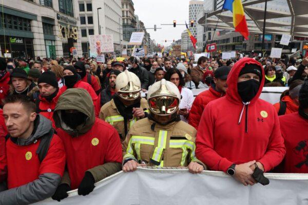 Demonstrators take part in a march against recent vaccine mandates imposed in Belgium, in Brussels on Dec. 19, 2021. (Nicolas Maeterlinck/Belga/AFP via Getty Images)