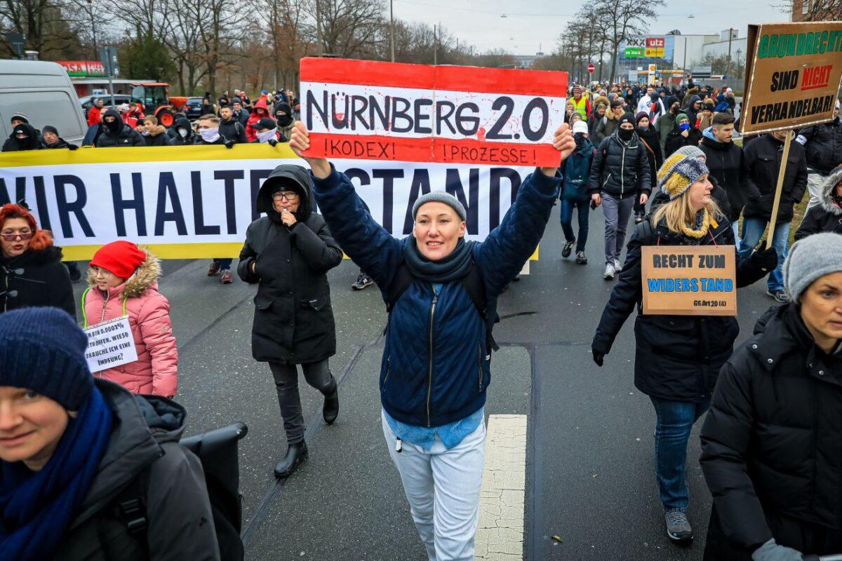 Participants protest in Nuremberg, Germany, on Dec. 19, 2021. (Photo by Leonhard Simon/Getty Images)