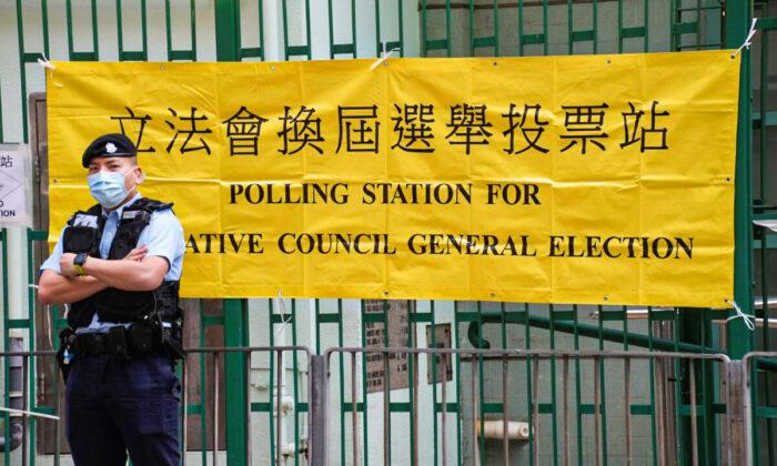 Hong Kong Holds Election With Only Beijing Loyalists Approved to Run