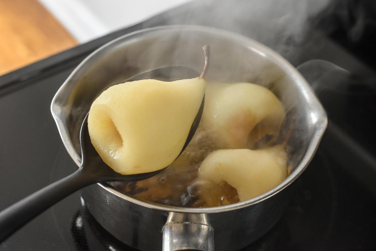 The perfect poach: Infuse the poaching liquid with your spices of choice, and submerge the pears until soft but not mushy throughout. (Audrey Le Goff)