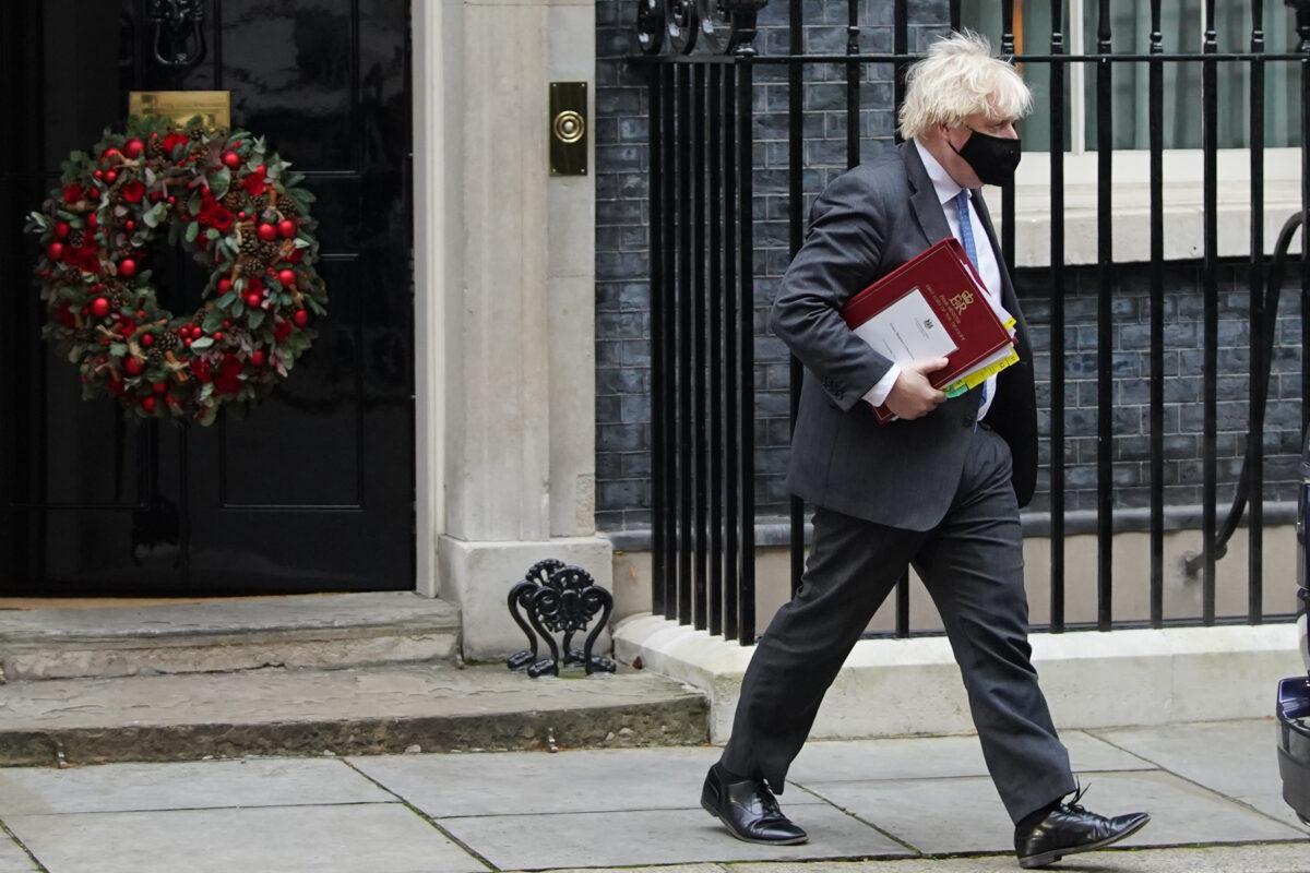 Prime Minister Boris Johnson leaves 10 Downing Street, London, on Dec. 15, 2021. (Stefan Rosseau/PA)