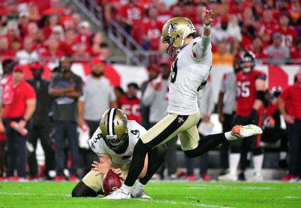 Brett Maher #19 of the New Orleans Saints kicks a field goal during the 1st quarter of the game against the Tampa Bay Buccaneers at Raymond James Stadium in Tampa, Fla., on Dec. 19, 2021. (Julio Aguilar/Getty Images)