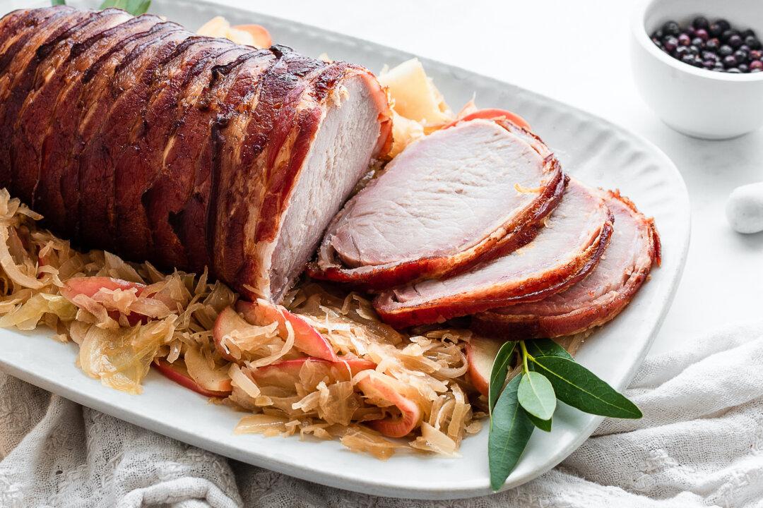A New Year’s Roast for Riches: Bacon-Wrapped Pork Loin With Cider-Braised Sauerkraut