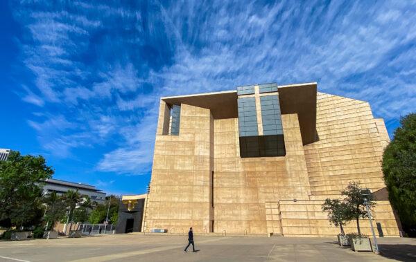 A man walks outside of the Cathedral of Our Lady of the Angels in Los Angeles on March 22, 2020. (Apu Gomes/Getty Images)