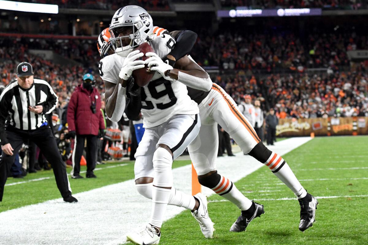Bryan Edwards #89 of the Las Vegas Raiders catches the ball as Denzel Ward #21 of the Cleveland Browns defends in the first quarter of the game at FirstEnergy Stadium, in Cleveland, on Dec. 20, 2021. (Nick Cammett/Getty Images)