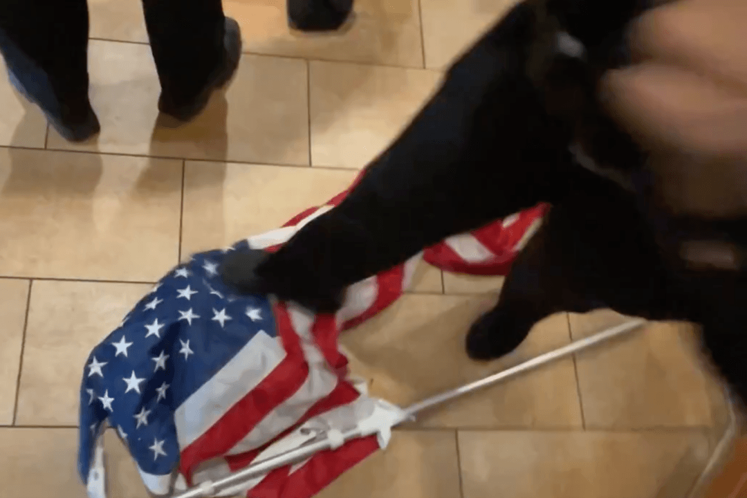 NYPD Officer Throws American Flag on Floor, Tramples It During Scuffle With Protesters